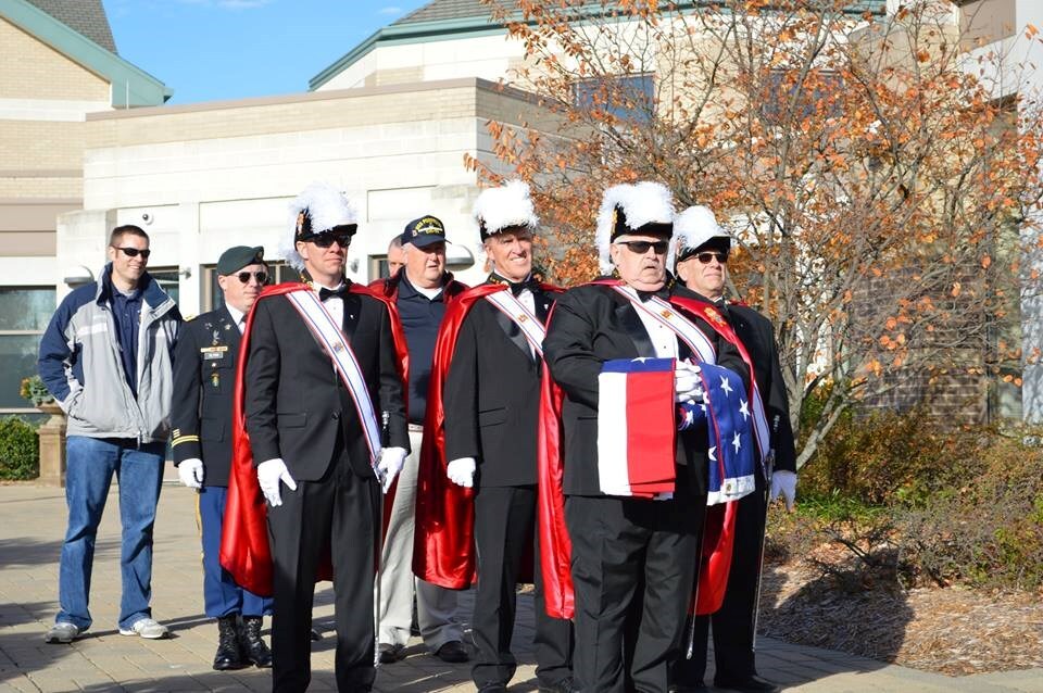 Knights walking with flag